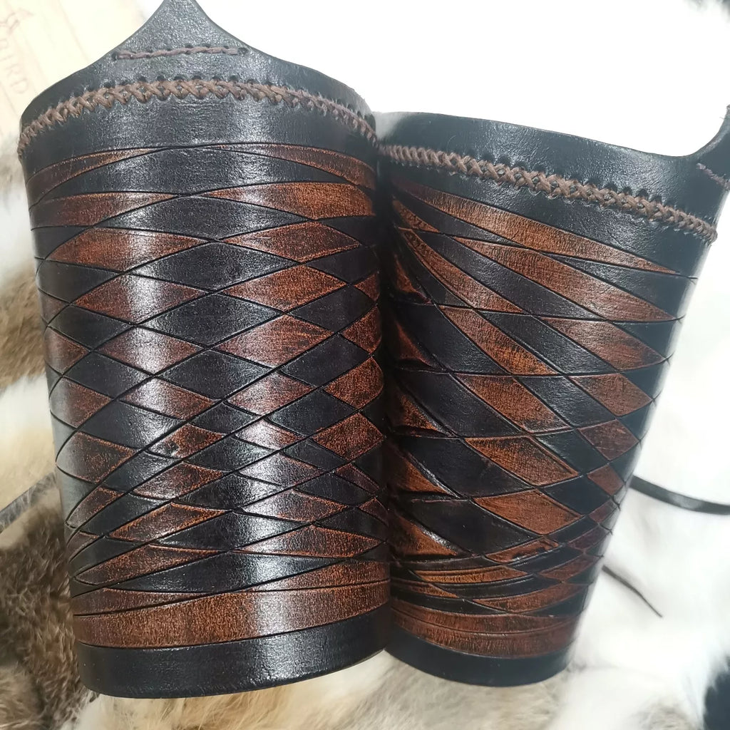 1 OF 1 LEATHER WRIST BRACERS