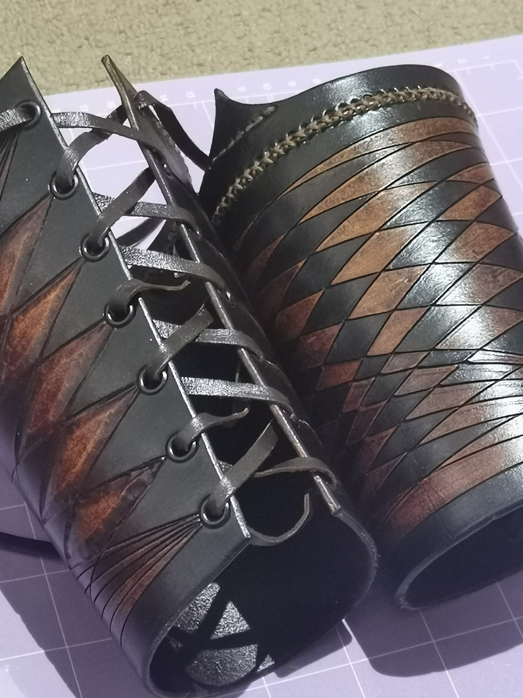 1 OF 1 LEATHER WRIST BRACERS